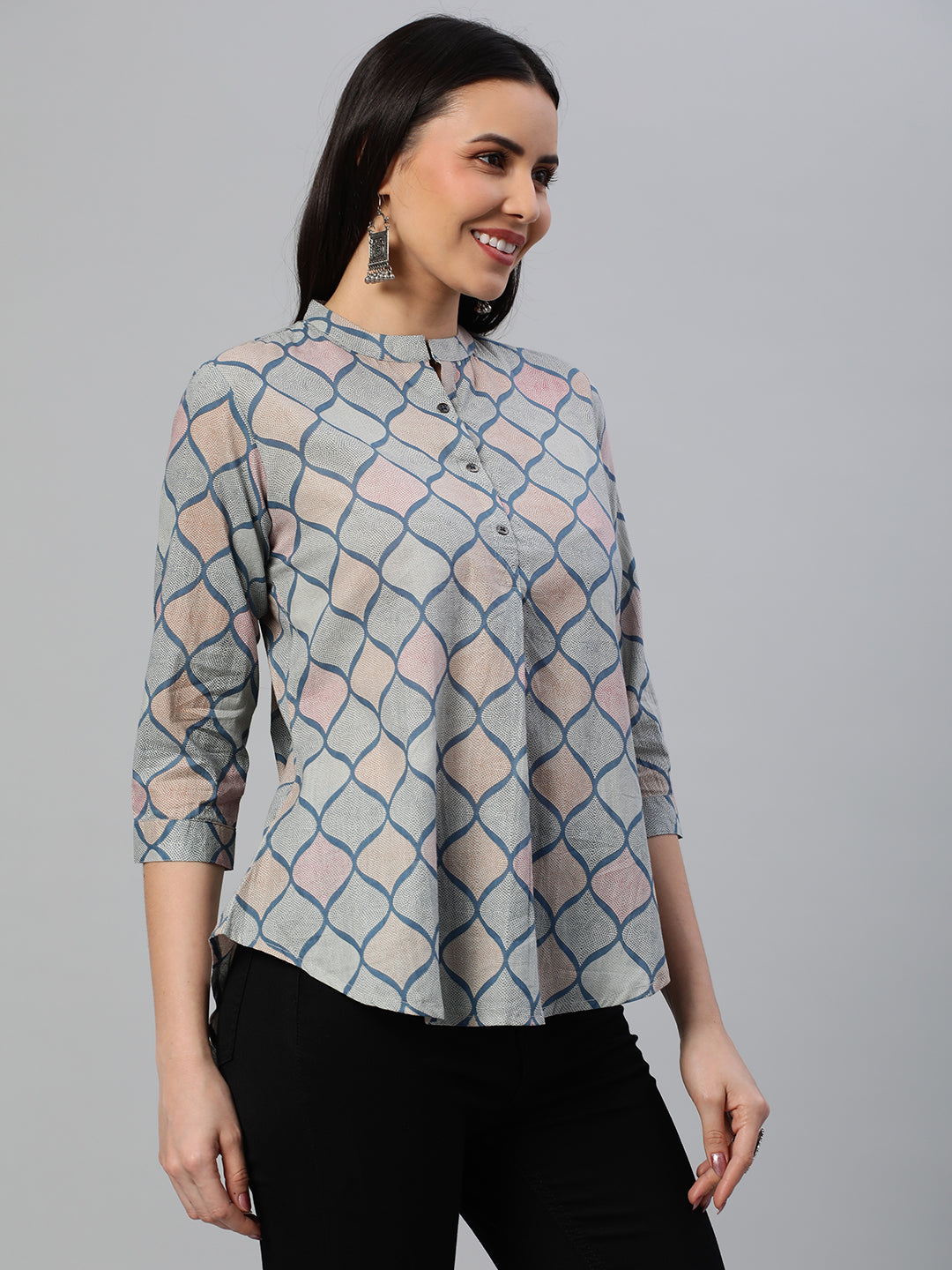 Flared printed cotton top with stand collar, knife pleat and button detailing