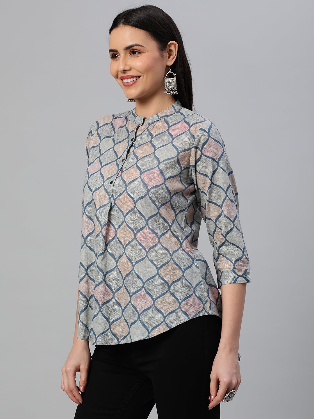 Flared printed cotton top with stand collar, knife pleat and button detailing
