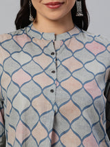 Flared printed cotton top with stand collar, knife pleat and button detailing