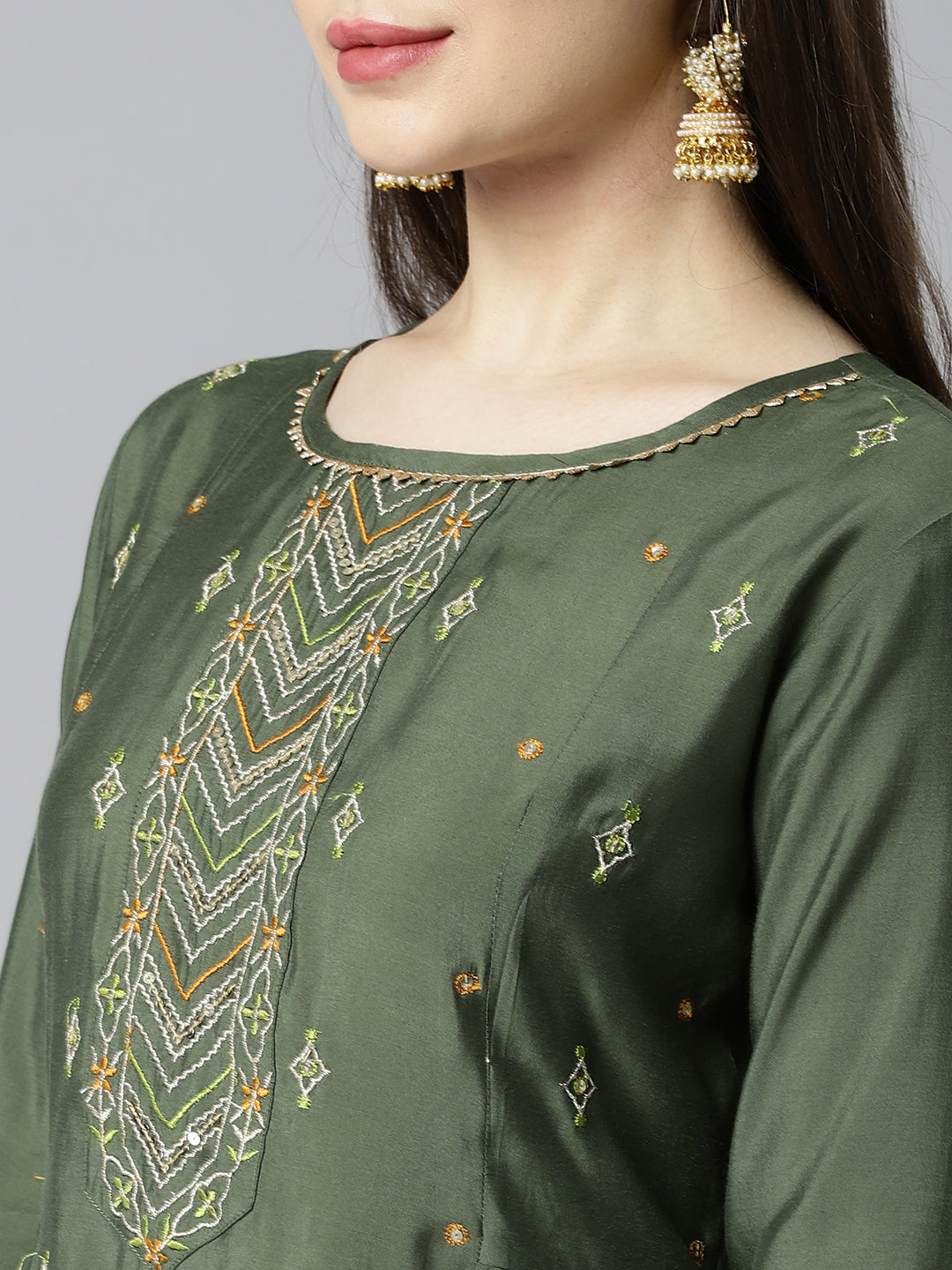 Party Edit- A line silk blend kurta with embroidered neck paired with dupatta and self tone bottom