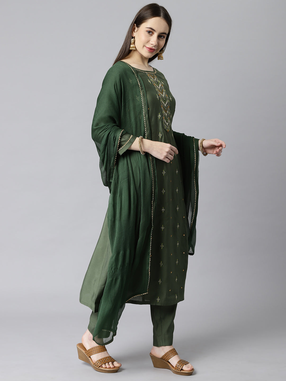 Party Edit- A line silk blend kurta with embroidered neck paired with dupatta and self tone bottom