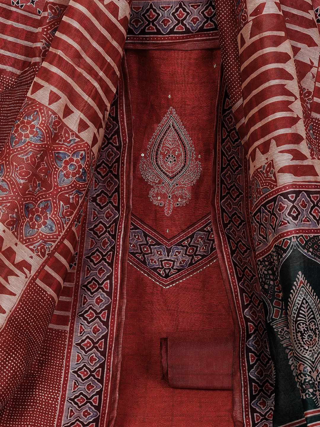 Unstitched 3-Piece Art Silk Suit Set with Embroidered Yoke, Printed Dupatta.(Rust)