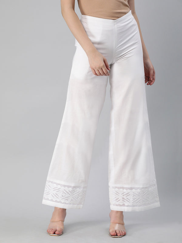 Flared cotton palazzo with applique detailing in hem.