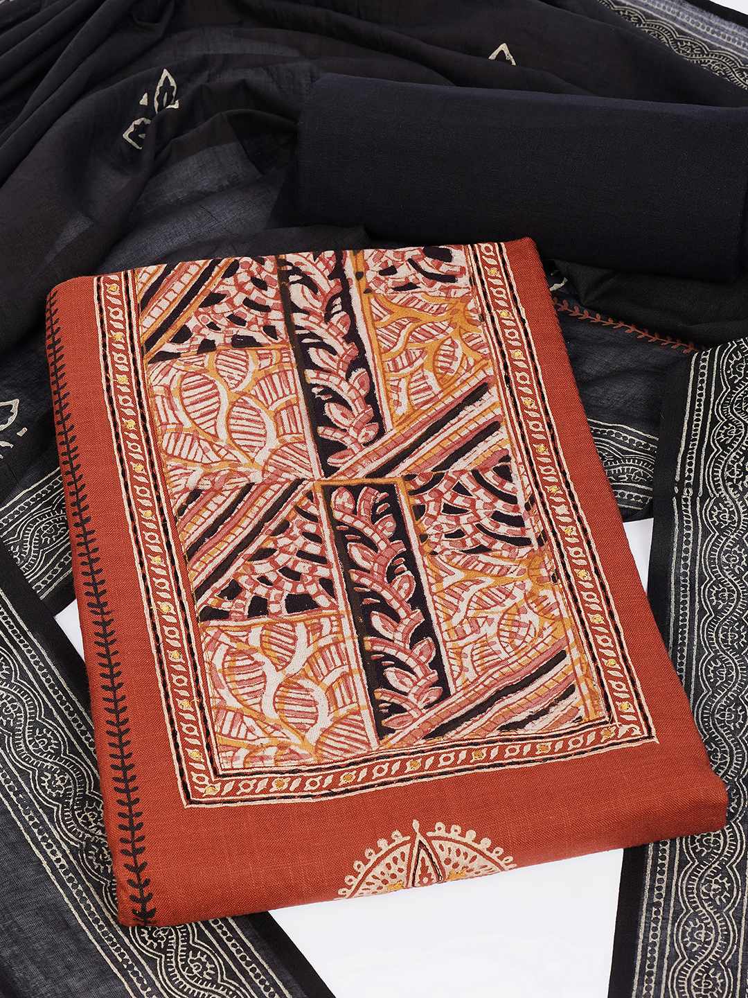 Unstitched Cotton Dress Material with kalamkari Yoke, thread work & Printed Dupatta.(Rust)