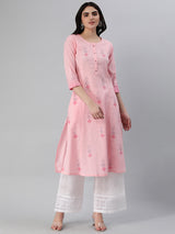 Flared cotton palazzo with applique detailing in hem.