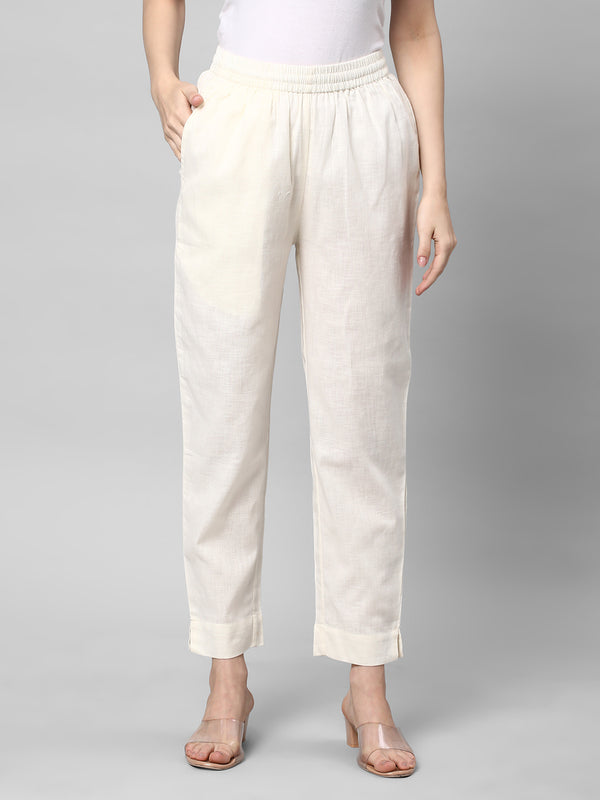 A fully elasticated off-white ankle length cotton linen pant.