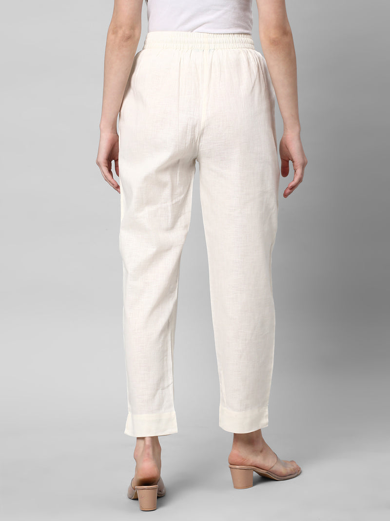 A fully elasticated off-white ankle length cotton linen pant.