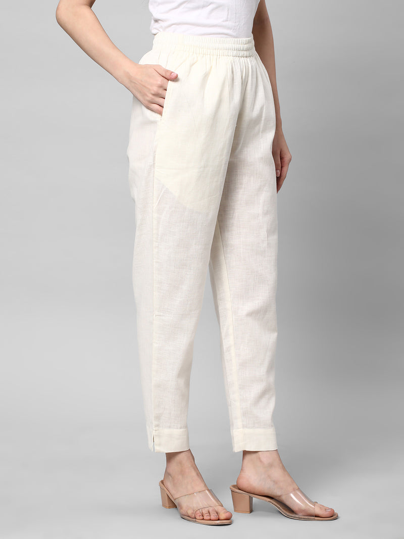 A fully elasticated off-white ankle length cotton linen pant.