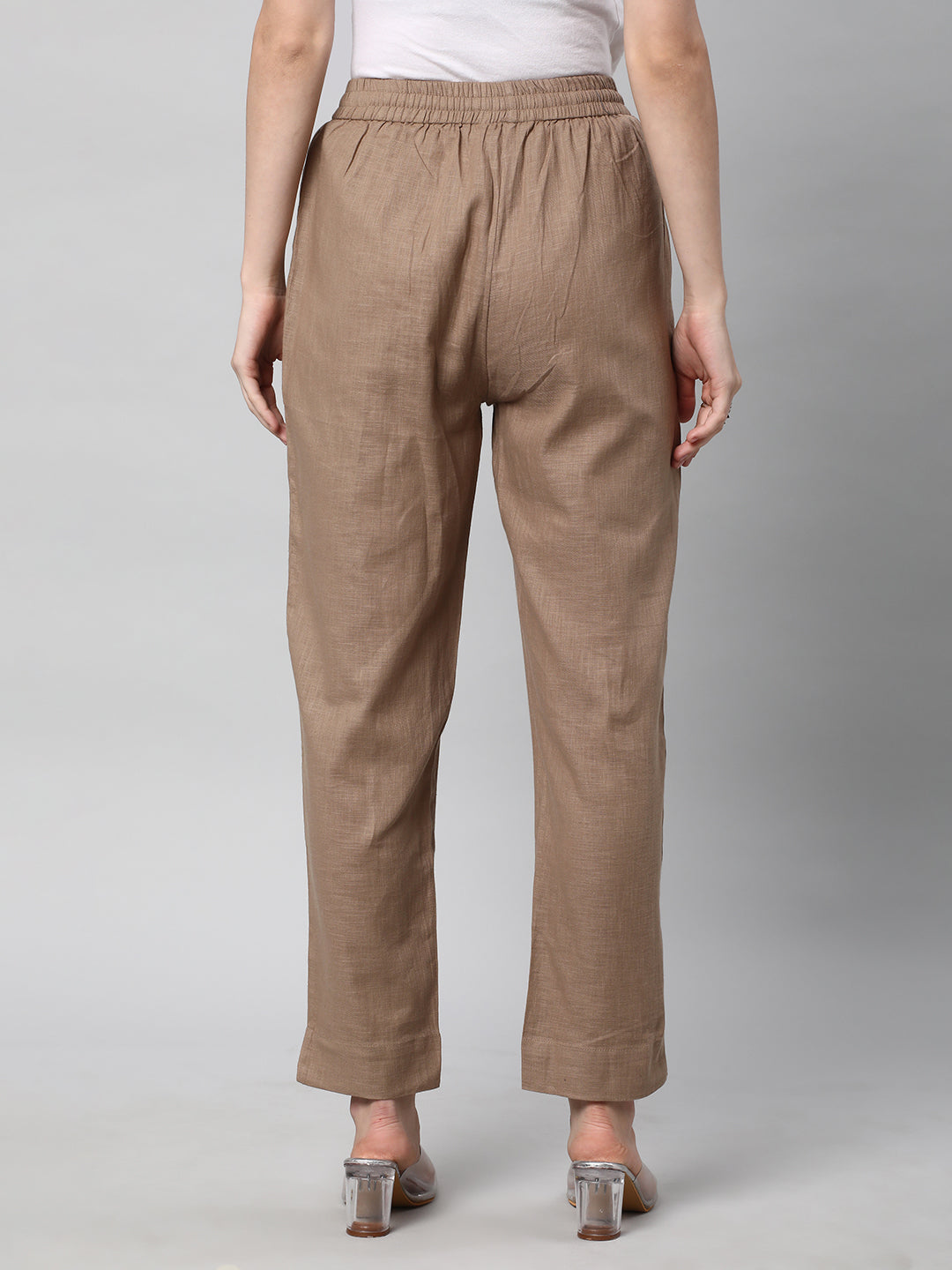 A fully elasticated brown ankle length cotton linen pant