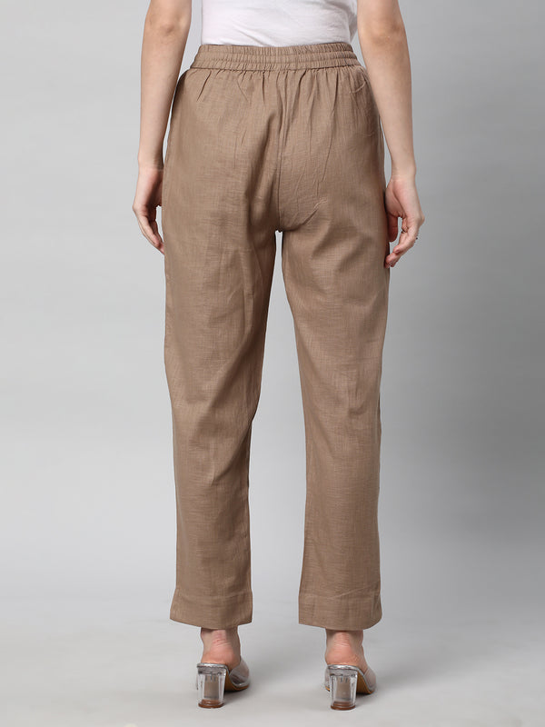 A fully elasticated brown ankle length cotton linen pant.