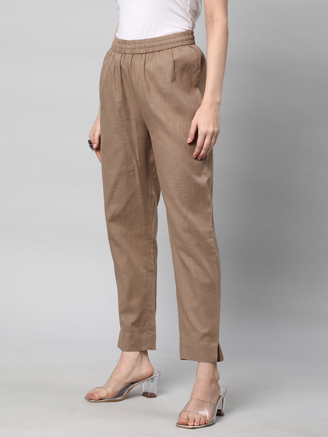 A fully elasticated brown ankle length cotton linen pant
