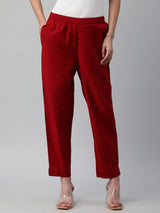 A fully elasticated maroon ankle length cotton linen pant.