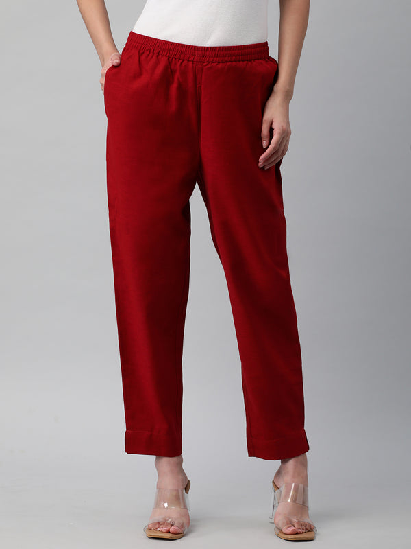 A fully elasticated maroon ankle length cotton linen pant.