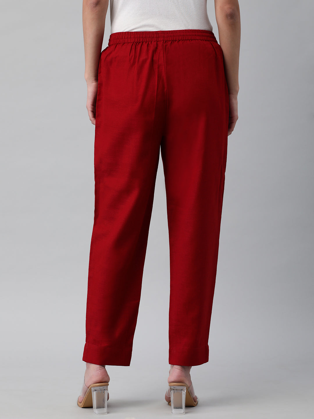 A fully elasticated maroon ankle length cotton linen pant