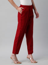 A fully elasticated maroon ankle length cotton linen pant.