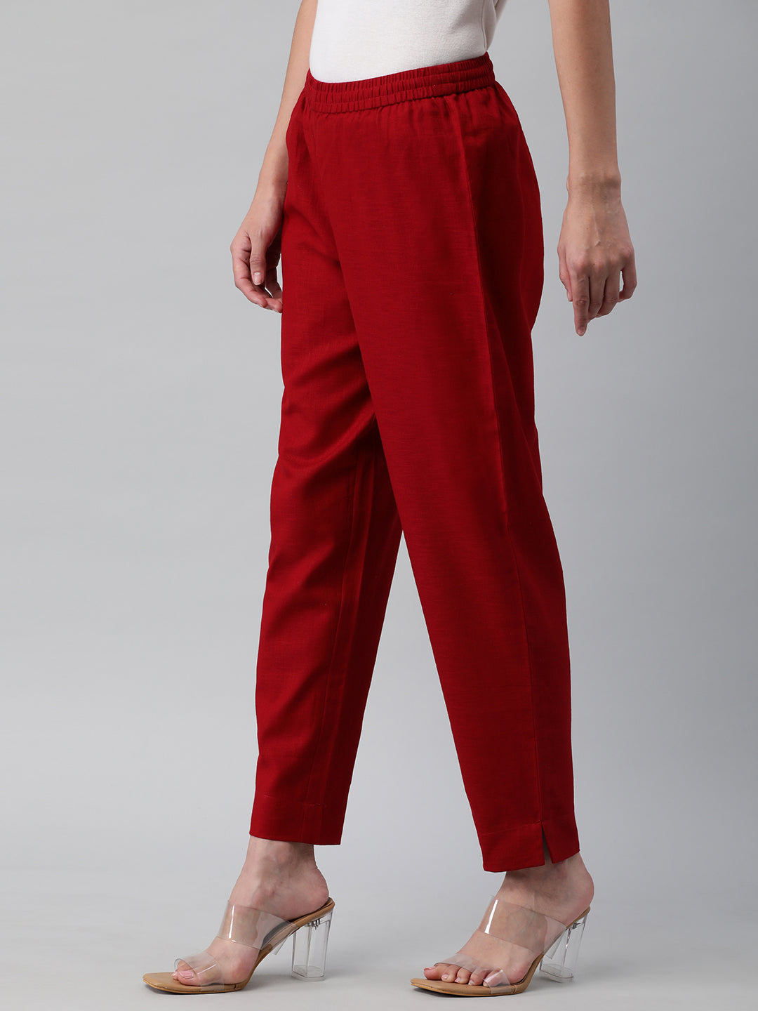 A fully elasticated maroon ankle length cotton linen pant