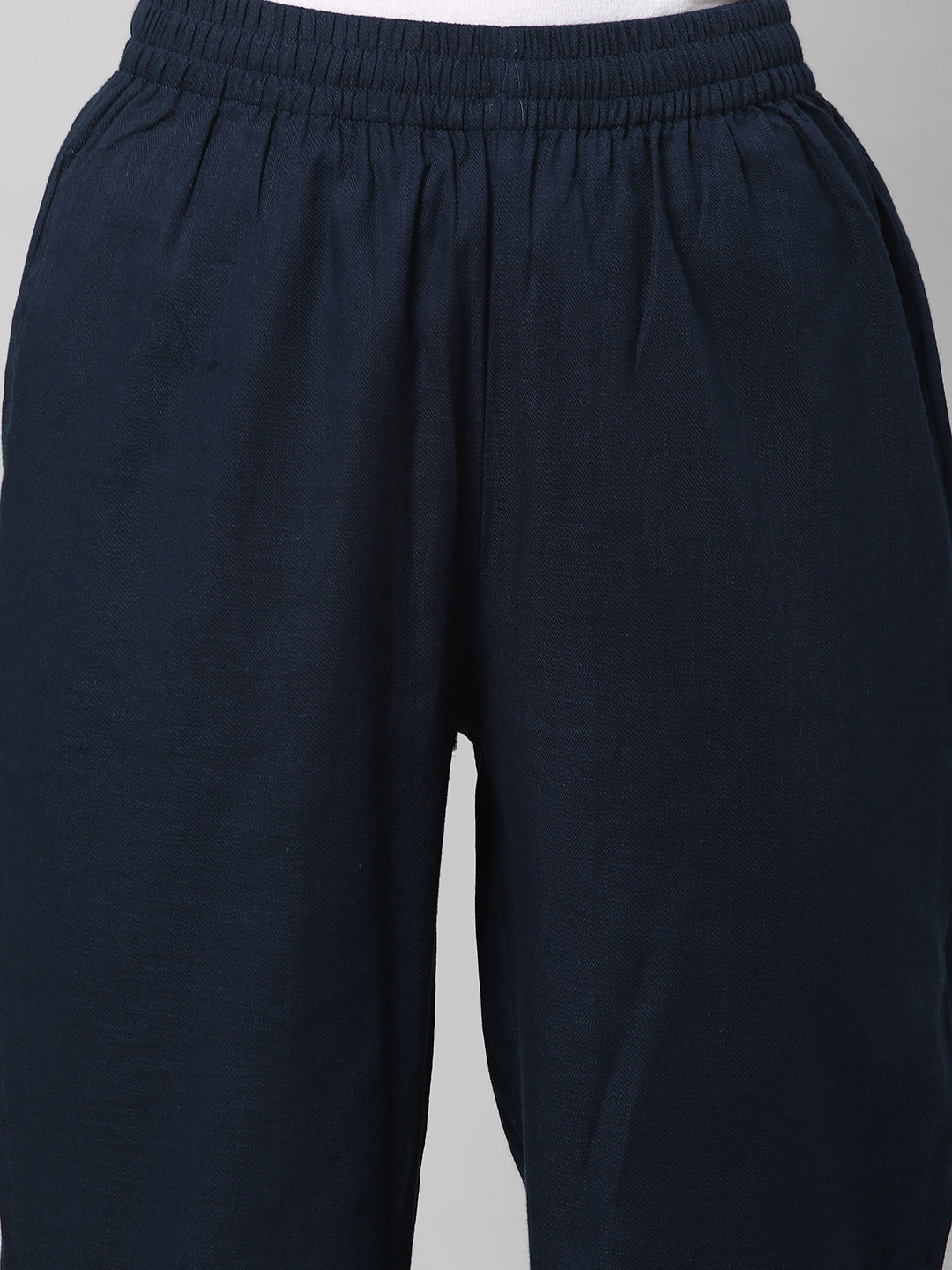A fully elasticated blue ankle length cotton linen pant