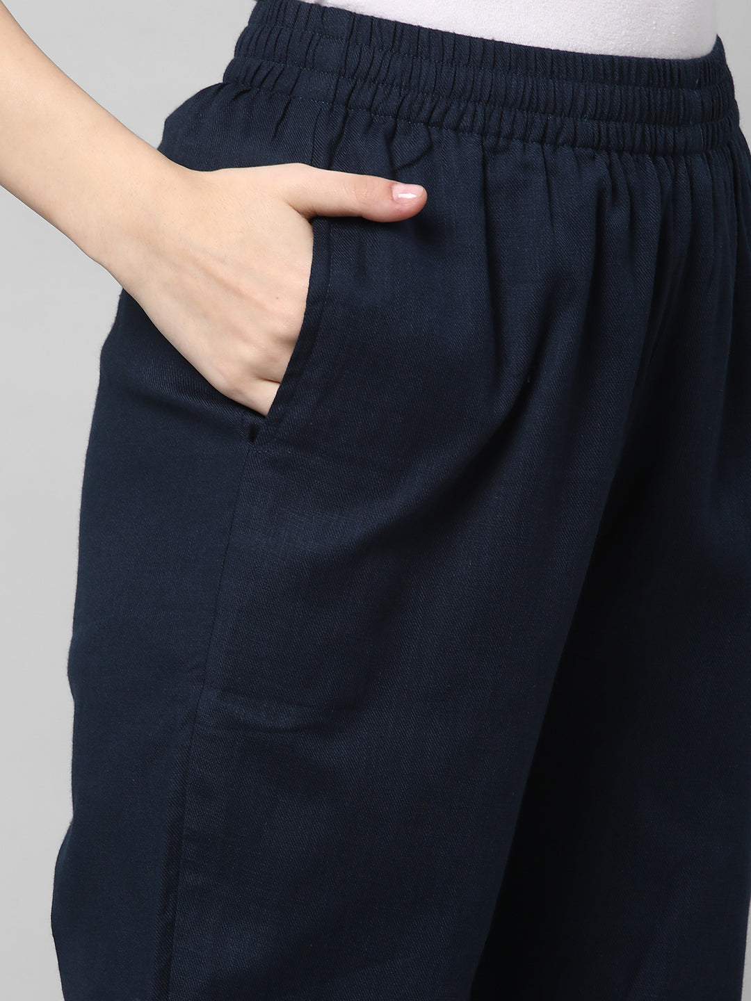 A fully elasticated blue ankle length cotton linen pant