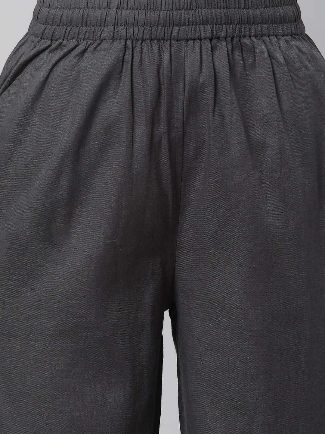 A fully elasticated grey ankle length cotton linen pant