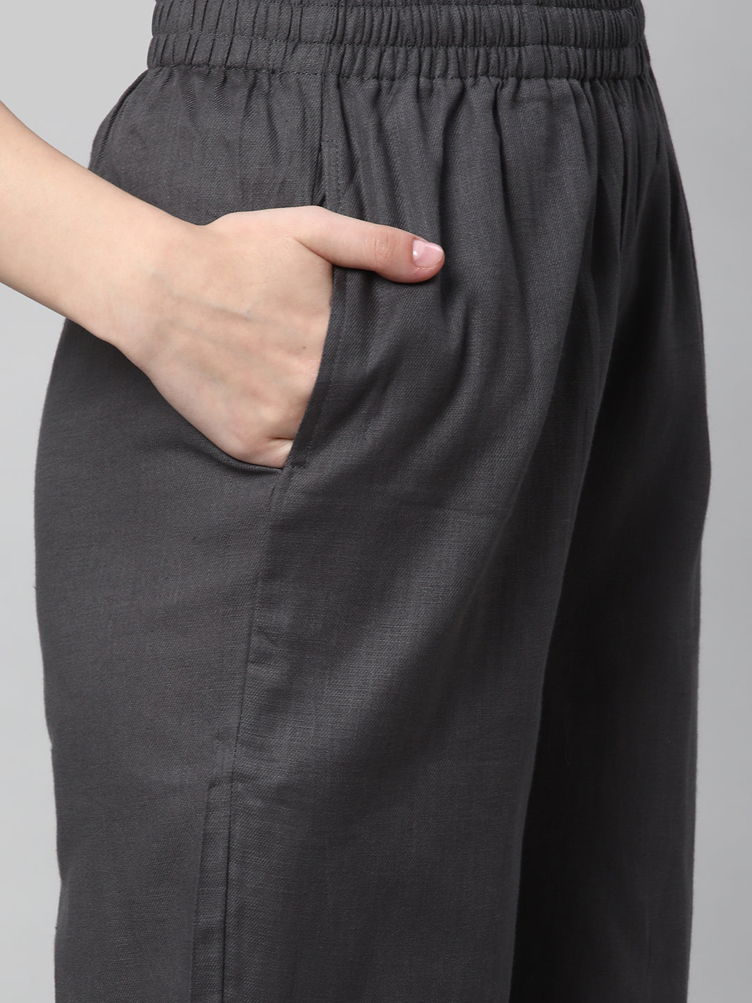 A fully elasticated grey ankle length cotton linen pant