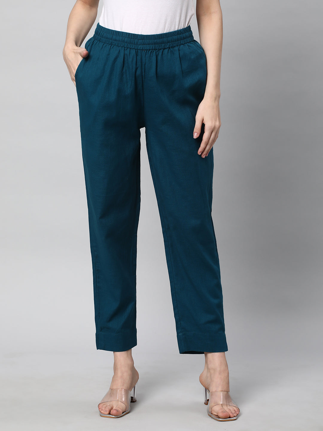 A fully elasticated teal ankle length cotton linen pant