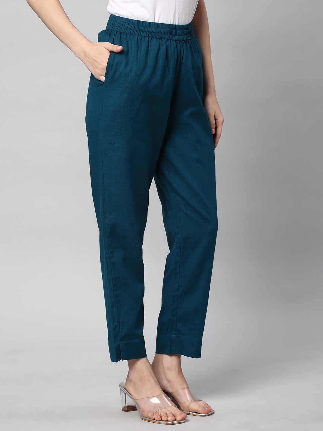 A fully elasticated teal ankle length cotton linen pant