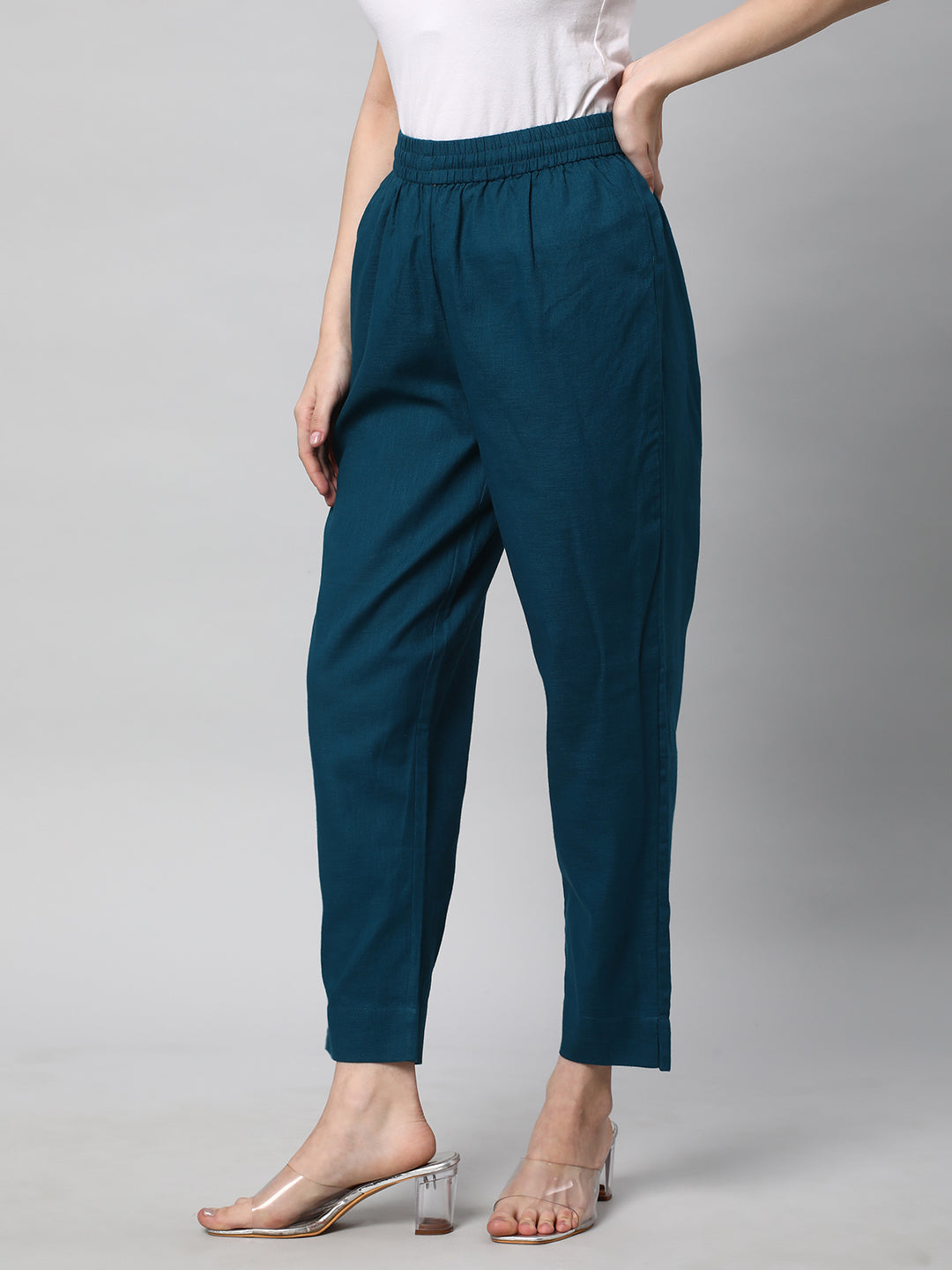A fully elasticated teal ankle length cotton linen pant