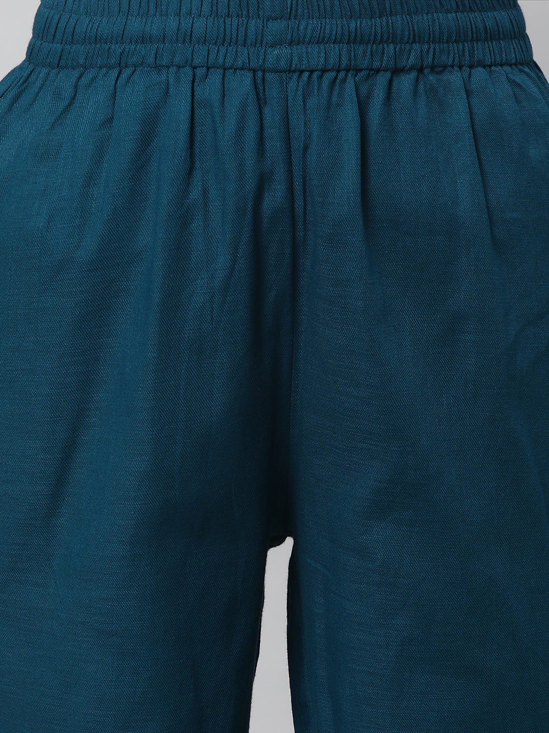 A fully elasticated teal ankle length cotton linen pant