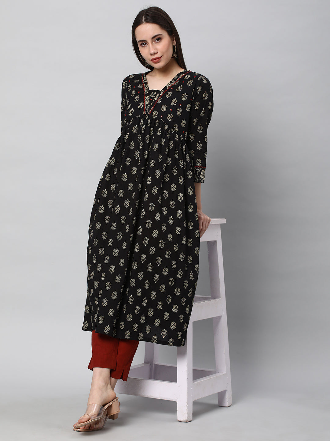 A fully elasticated rust ankle length cotton linen pant