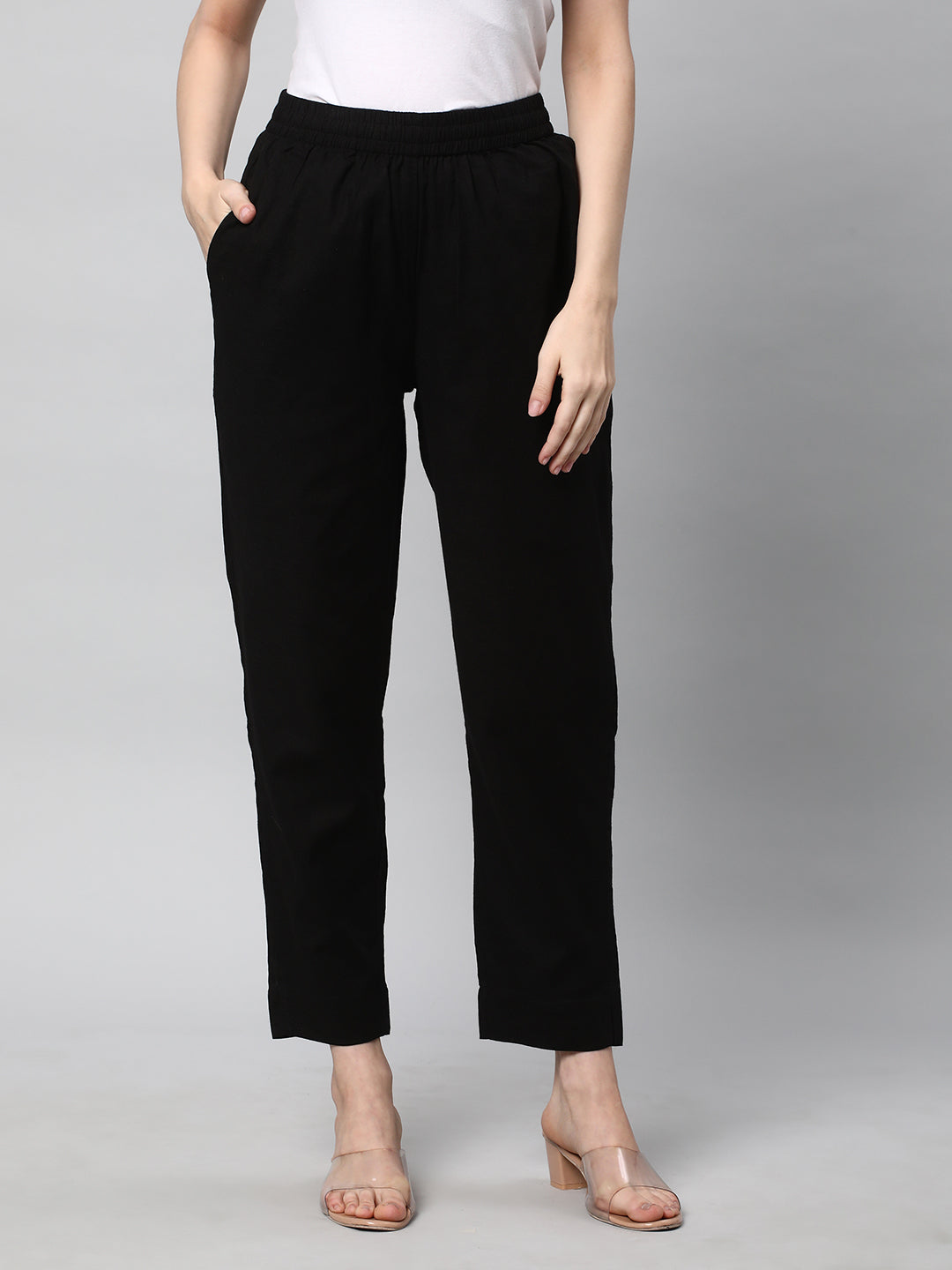 A fully elasticated black ankle length cotton linen pant
