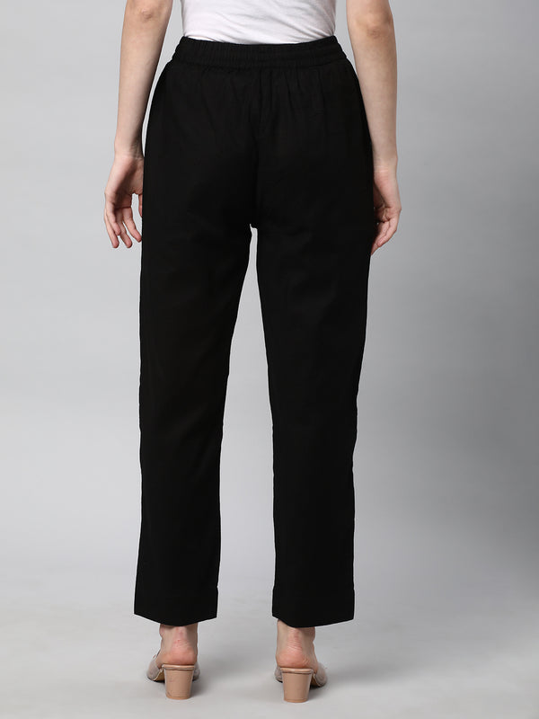 A fully elasticated black ankle length cotton linen pant.