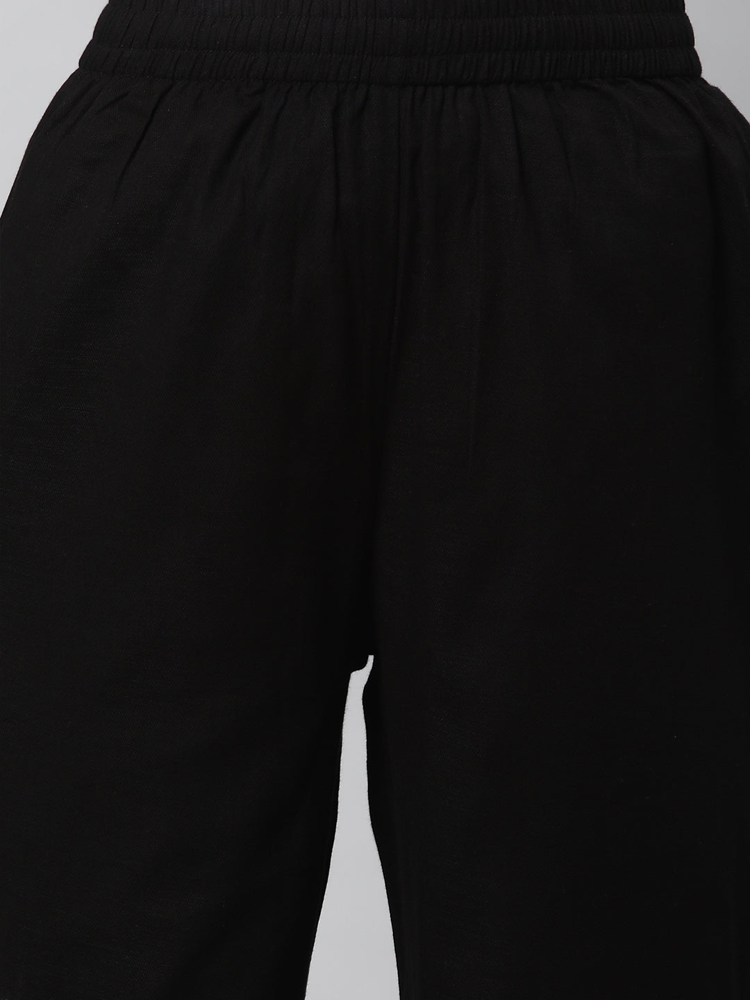 A fully elasticated black ankle length cotton linen pant