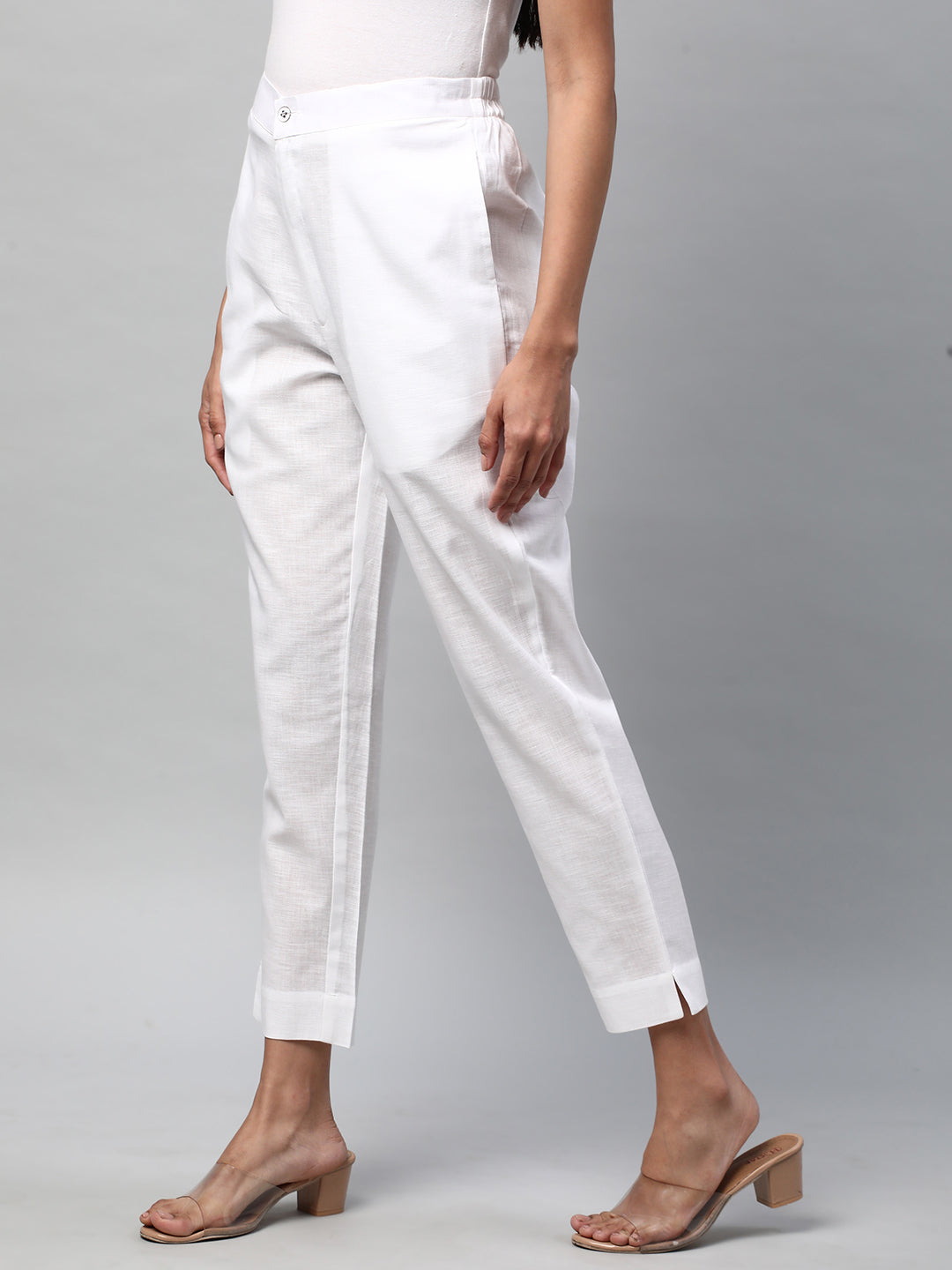 A White ankle length coton linen pant with plain belt in front