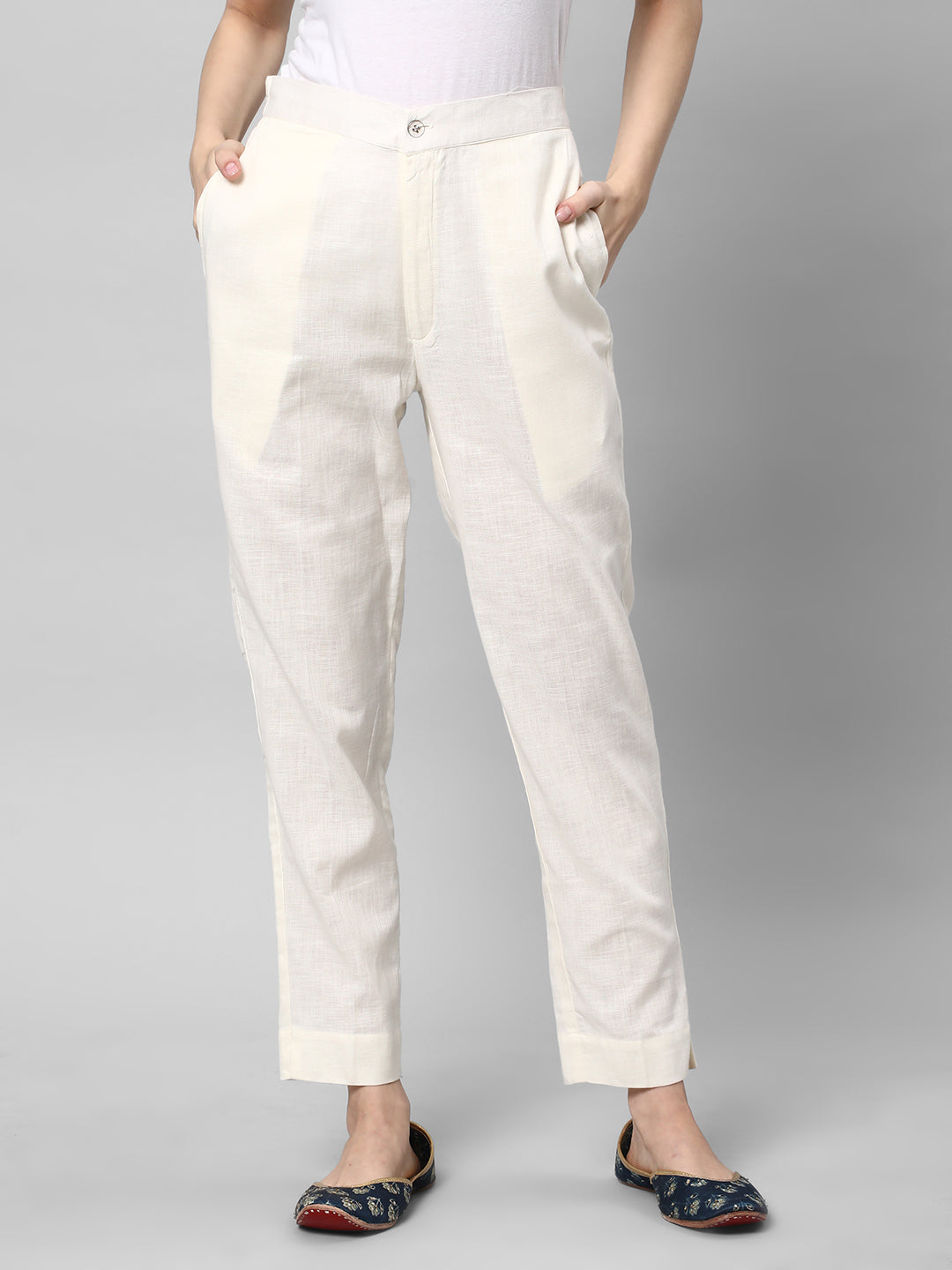 A Off-white ankle length cotton linen pant with plain belt in front