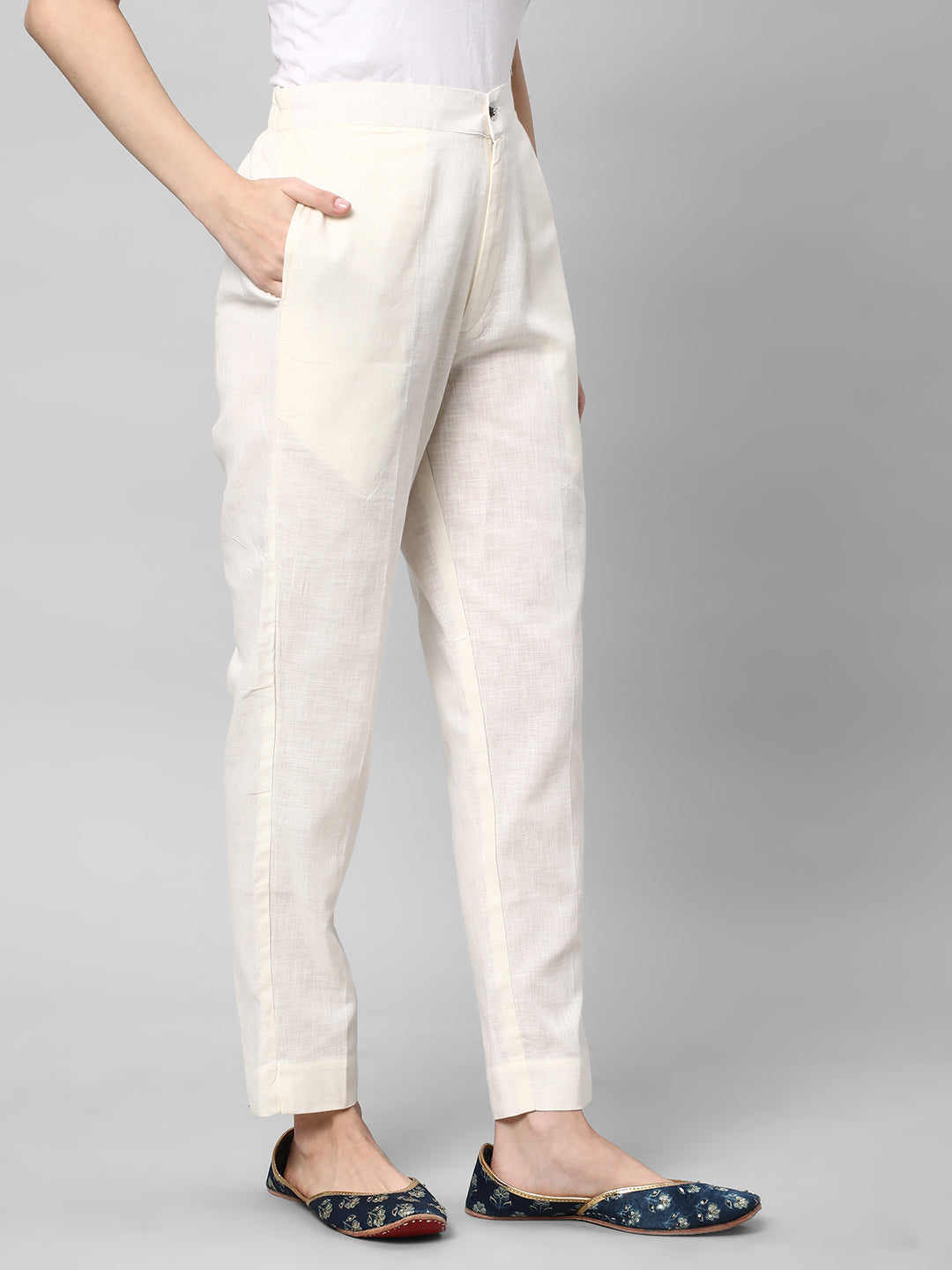 A Off-white ankle length cotton linen pant with plain belt in front