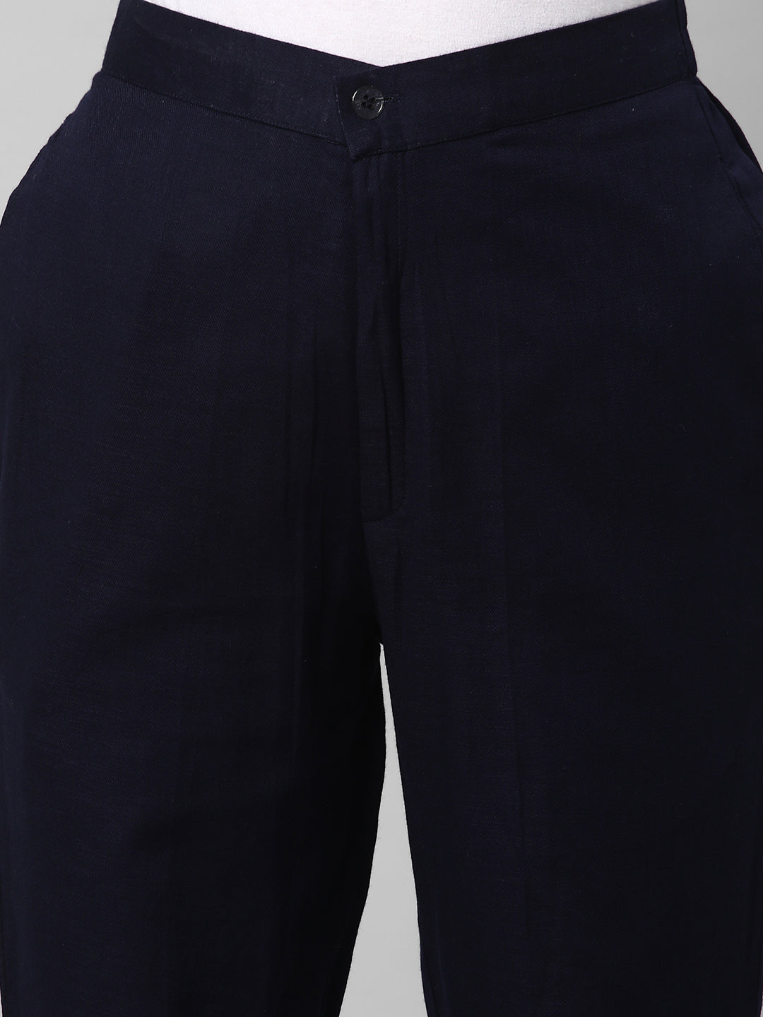 A Navy ankle length cotton linen pant with plain belt in front