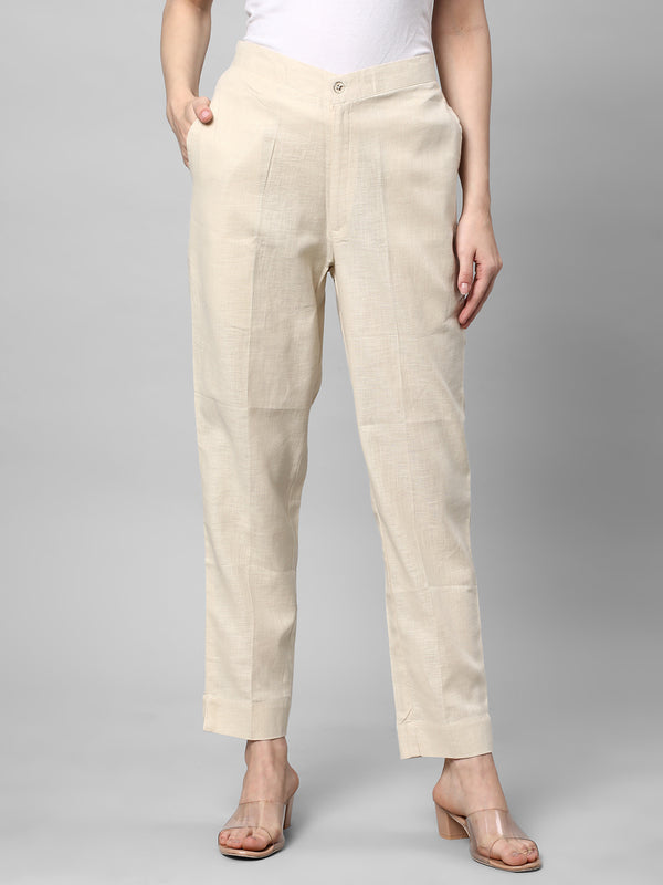 A Cream ankle length cotton linen pant with plain belt in front.