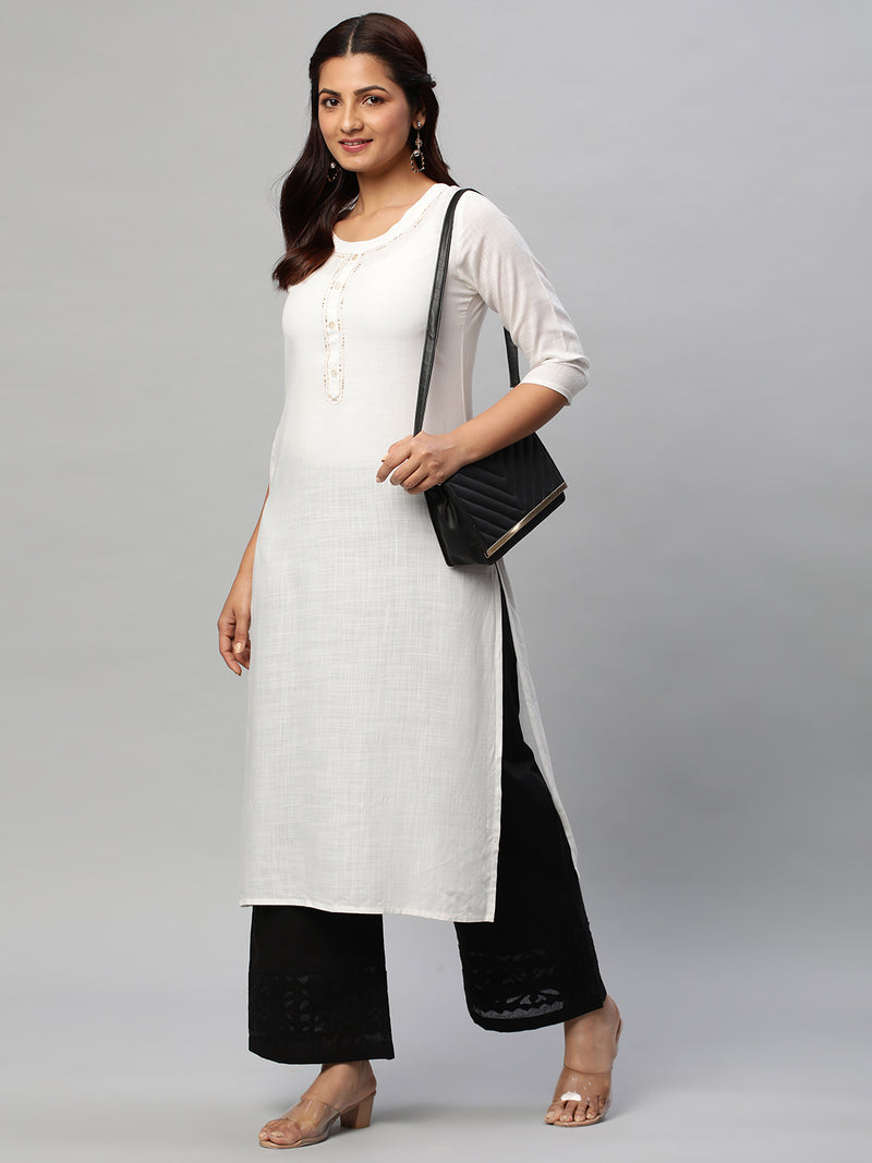 Flared cotton palazzo with applique detailing in hem.