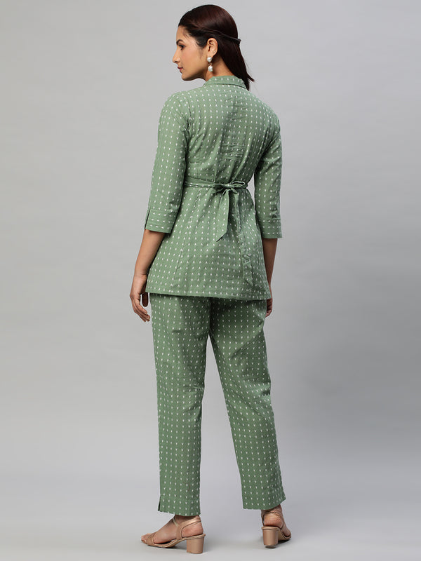 A statement dobby fabric co-ord set with collar and belt.