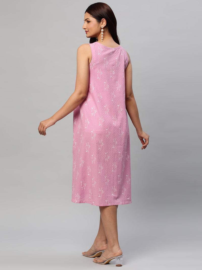 A line dress in printed cotton jacquard with a side pocket.