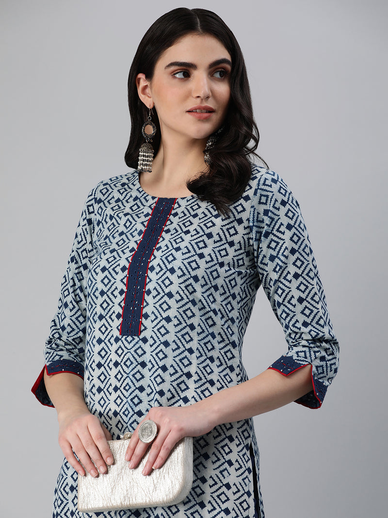 Straight fit indigo print kurta with detailing of schiffli on placket and sleeves.