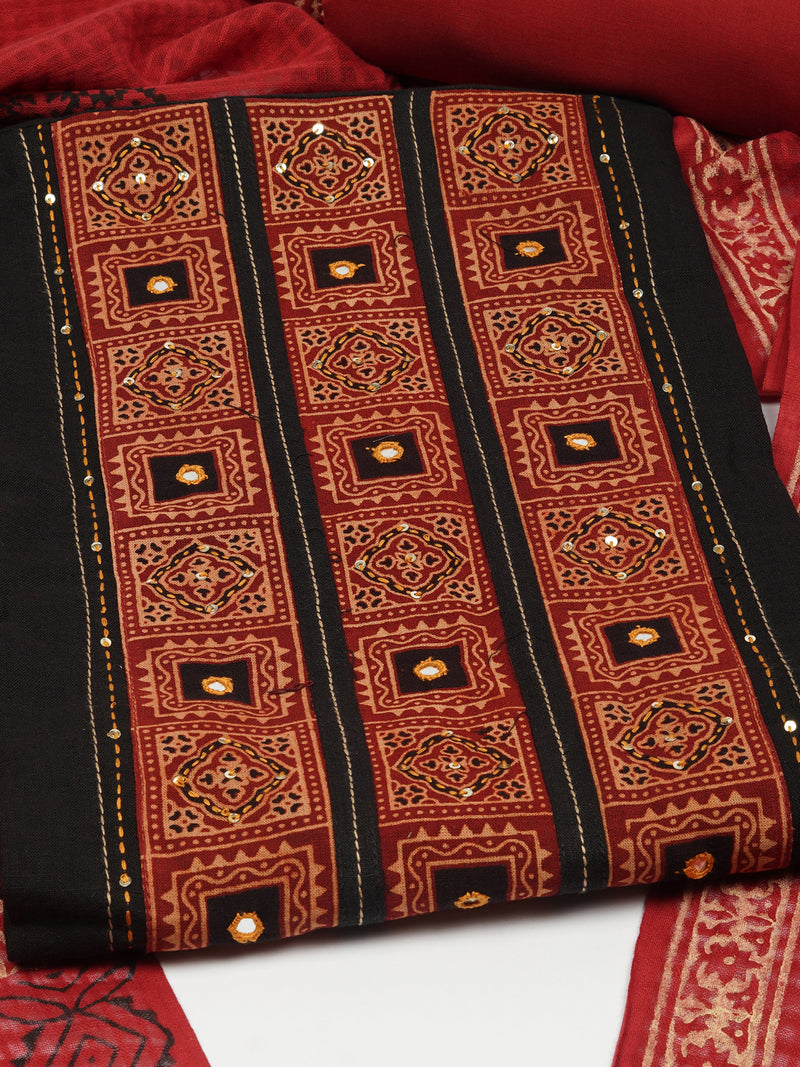 Black unstitched suit set with a mix-and-match yoke and handwork details with printed dupatta and plain bottom