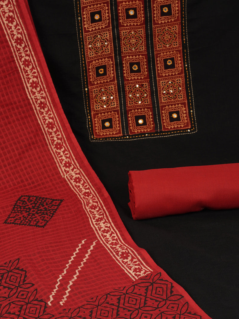 Black unstitched suit set with a mix-and-match yoke and handwork details with printed dupatta and plain bottom