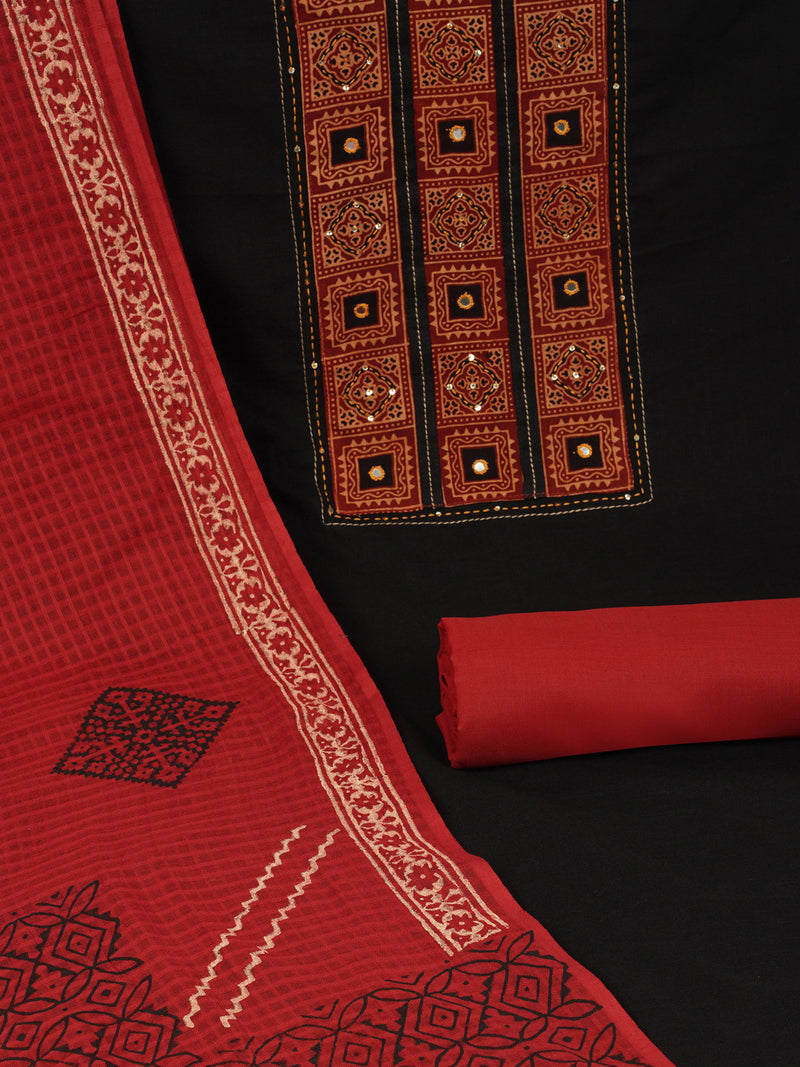Black unstitched suit set with a mix-and-match yoke and handwork details with printed dupatta and plain bottom