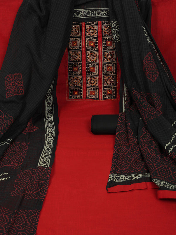 Maroon unstitched suit set with a mix-and-match yoke and handwork details with printed dupatta and plain bottom.