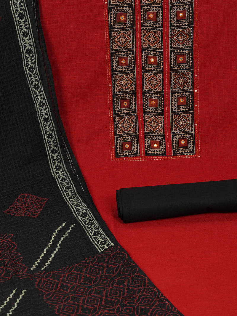 Maroon unstitched suit set with a mix-and-match yoke and handwork details with printed dupatta and plain bottom.