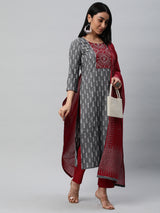 Unstitched cotton suit set with an ikat top and contrast-colored dupatta.