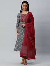 Unstitched cotton suit set with an ikat top and contrast-colored dupatta.