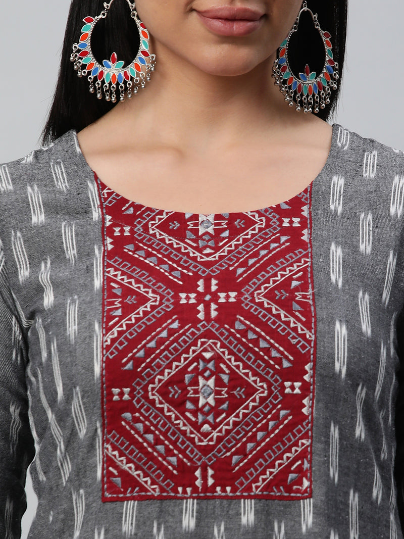 Unstitched cotton suit set with an ikat top and contrast-colored dupatta.