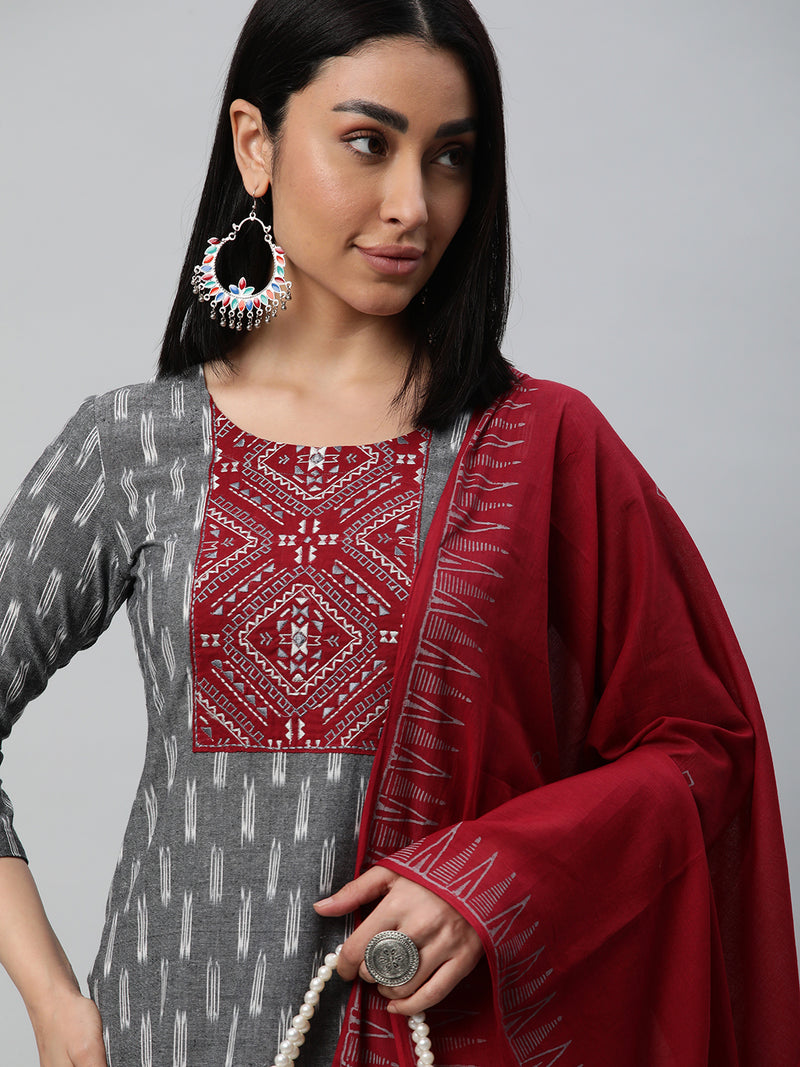 Unstitched cotton suit set with an ikat top and contrast-colored dupatta.